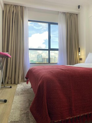 1 sovrum, värdeförvaringsskåp på rummet och strykjärn/strykbräda