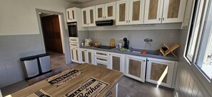 Fridge, microwave, cookware/dishes/utensils