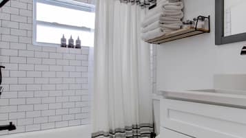 Hair dryer, towels, soap, toilet paper