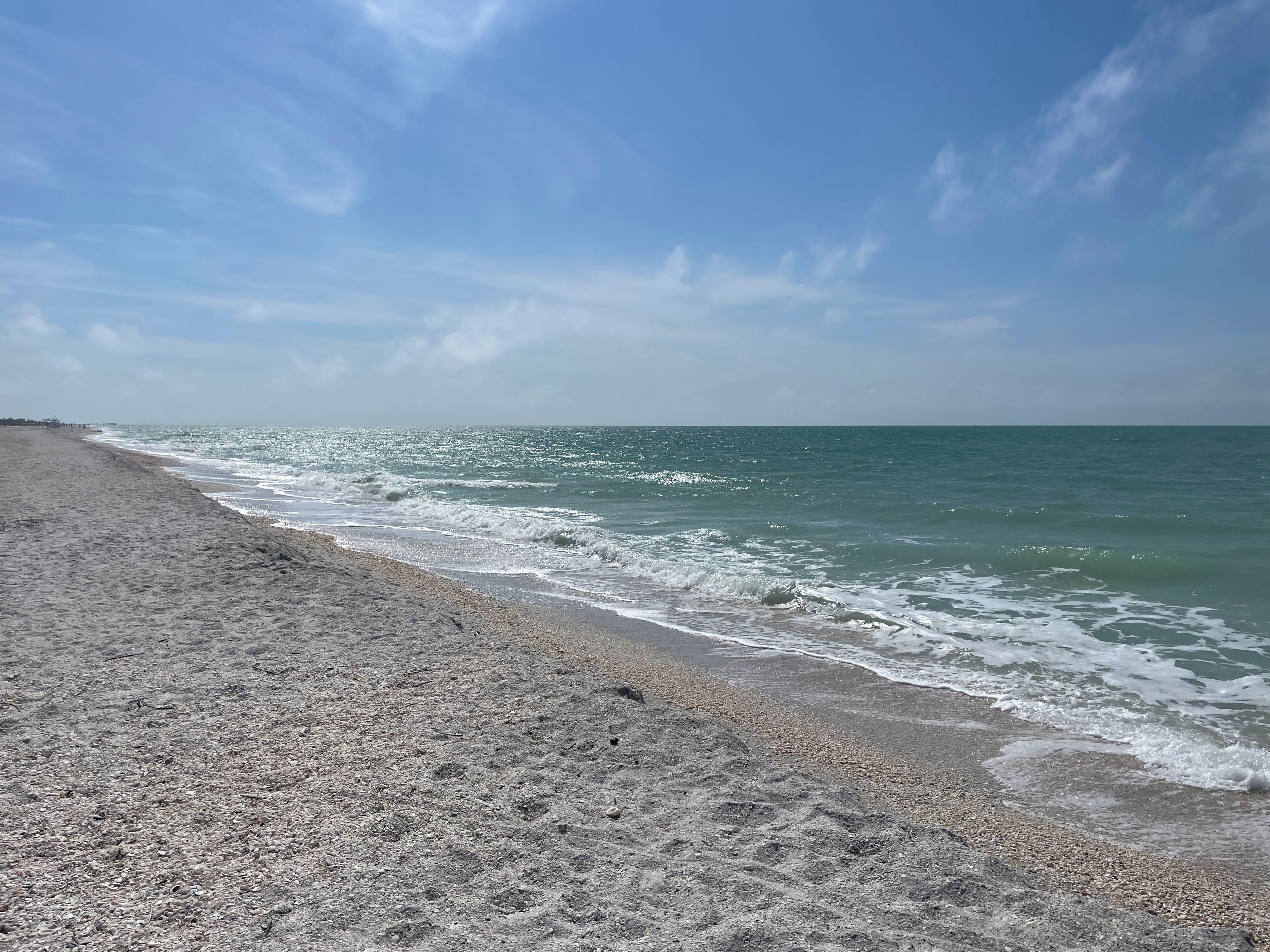 On the beach, sun loungers, beach towels