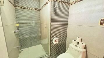 Shower, hair dryer, towels, soap