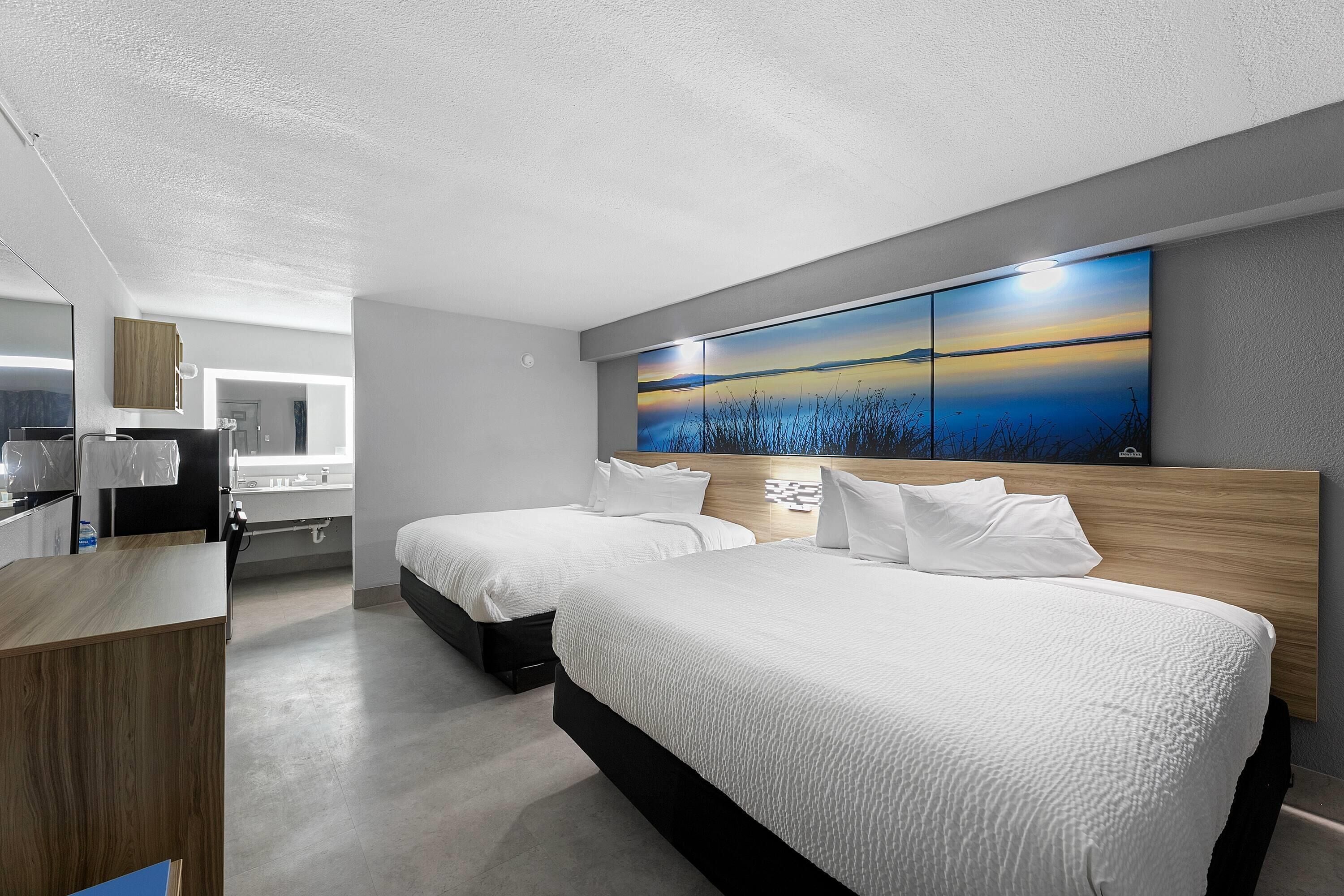 Suite, Multiple Beds, Non Smoking | Free WiFi, bed sheets