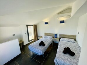 2 habitaciones, tabla de planchar con plancha, internet y ropa de cama