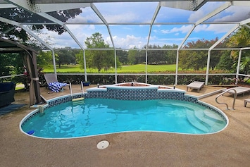 Sparkling Pool with Golf Course View