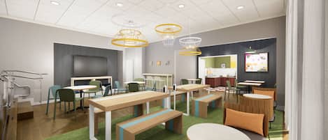 Une salle de réunion moderne, équipée de tables, de chaises et d’un grand écran.