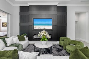 Smart TV, fireplace, video games, foosball