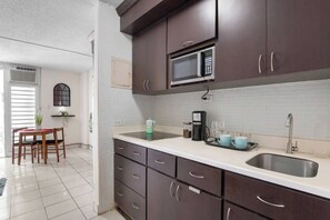 Fridge, microwave, stovetop, coffee/tea maker