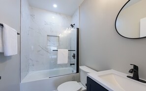 Hair dryer, towels, soap, toilet paper