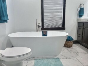 Hair dryer, towels, soap, toilet paper