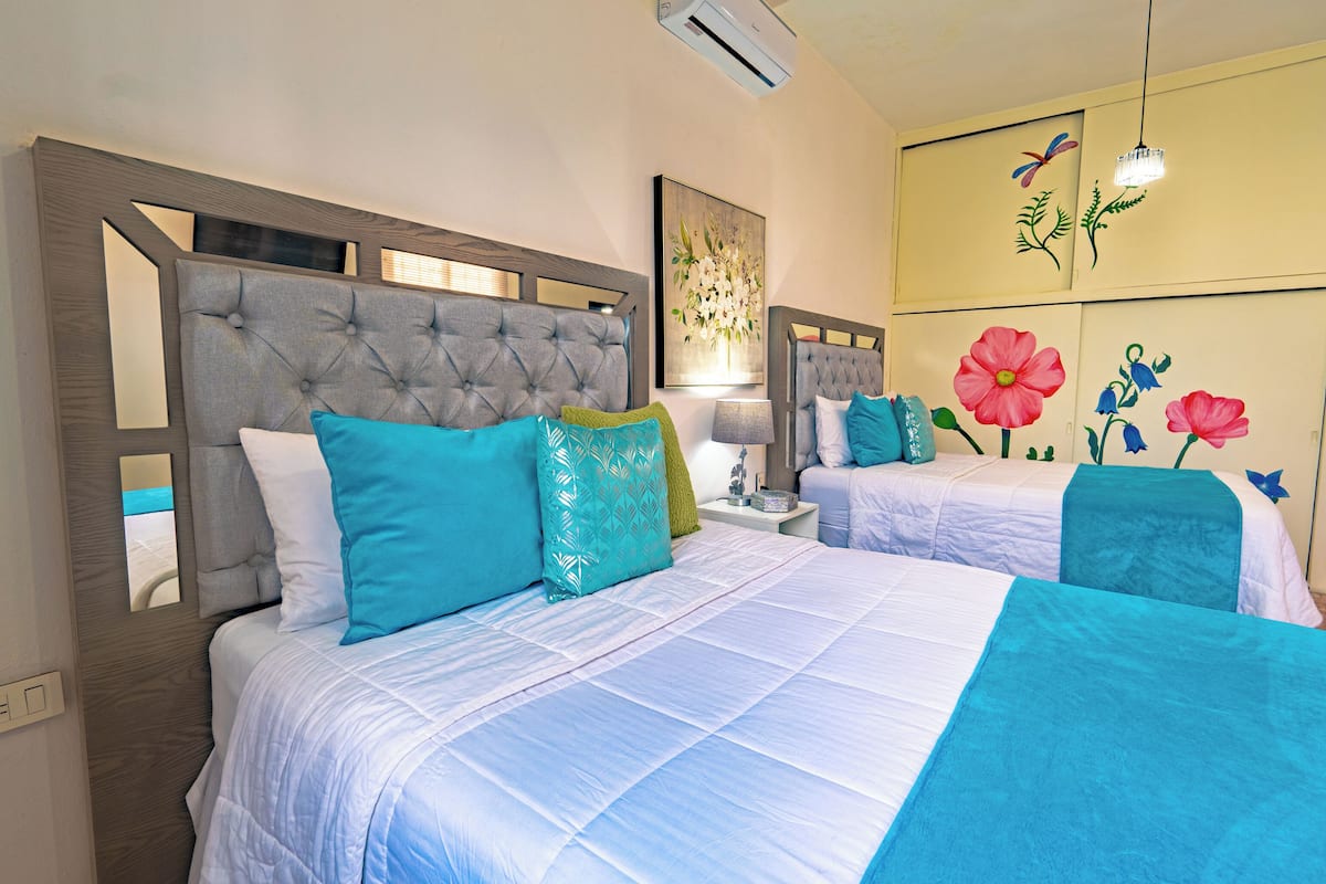 Exclusive Apartment, Patio | 4 bedrooms, desk, laptop workspace, blackout curtains