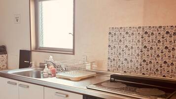 Fridge, microwave, cookware/dishes/utensils