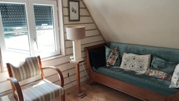 Comfort-Doppel- oder -Zweibettzimmer, Gartenblick | Wohnbereich