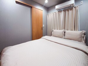 1 室のベッドルーム、WiFi (無料)、ベッドシーツ