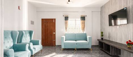 Apartment (2 Bedrooms) | Living area | TV