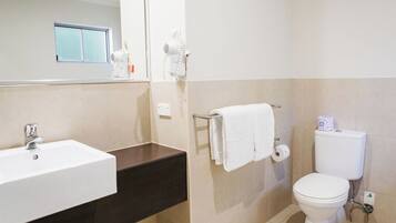 Shower, hair dryer, towels