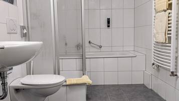 Hair dryer, towels, soap, shampoo