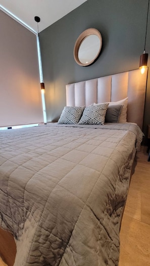 1 dormitorio, tabla de planchar con plancha, Internet y ropa de cama