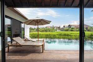 Outdoor pool, pool umbrellas, pool loungers
