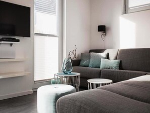 Klassiek huis, 2 slaapkamers | Woonkamer | Een open haard