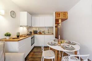 Appartement Standard, plusieurs chambres (Appartamento Rio Secco) | Cuisine privée | Réfrigérateur, micro-ondes, four, plaque de cuisson