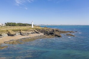 On the beach, sun loungers