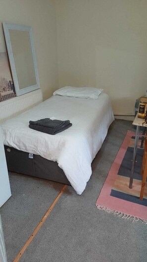 2 habitaciones y ropa de cama