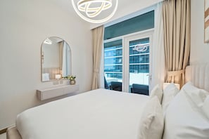 Appartement, balcon, vue ville | Wi-Fi gratuit