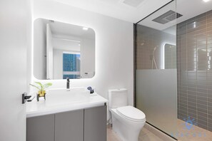 Shower, hair dryer, towels