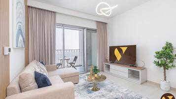 Apartamento superluxo, vista para a cidade | Área de estar