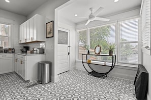 Kitchen area & back door to patio - Stay on Main - Large Home Near Plaza/Westport (Kansas City)