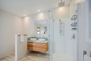 Shower, hair dryer, towels, soap