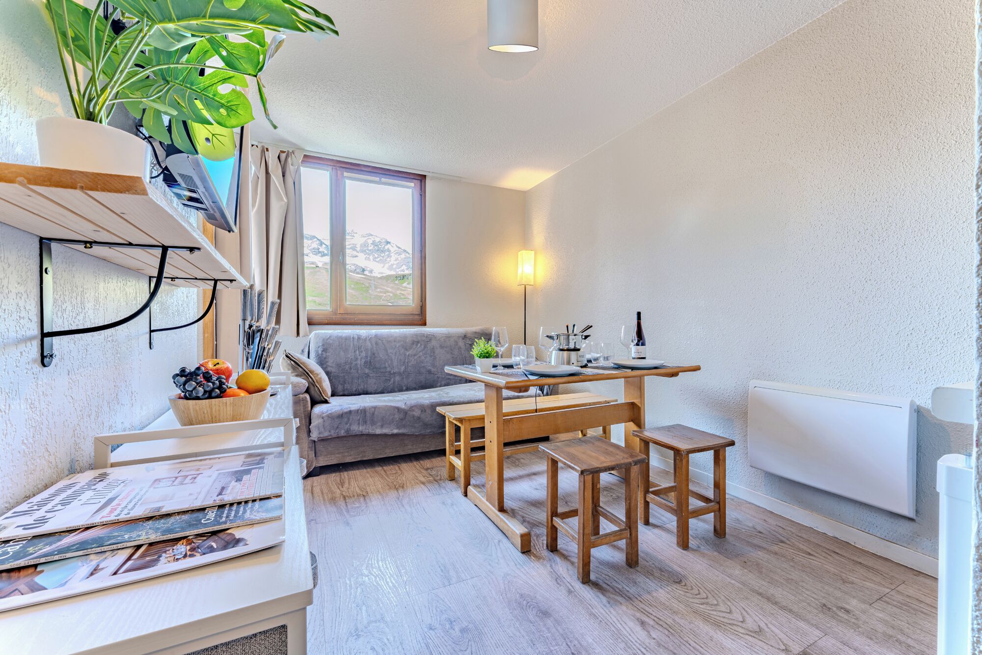 Deluxe Apartment, Balcony, Mountain View | Living area | 33-inch TV with digital channels