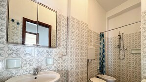A bathroom with a sink, toilet, and shower. - 2 Sea View Penthouse with Large Balcony (Bellaria-Igea Marina)