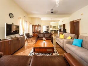 Villa (1 Bedroom) | Living area | 66-inch TV with digital channels