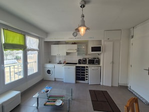 Microwave, stovetop, dishwasher, coffee/tea maker