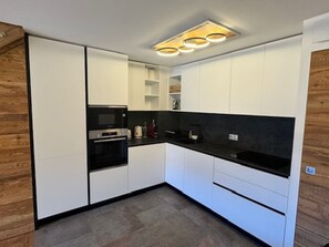 Fridge, microwave, dishwasher, coffee/tea maker