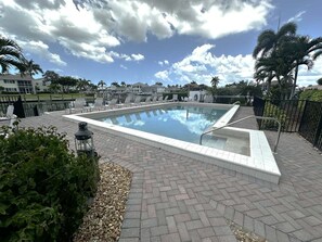 A heated pool - Waterfront 3BR condo in Marco Island with heated pool and WiFi. (Marco Island)
