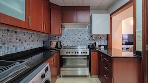 Appartement Luxe, balcon, vue ville | Cuisine privée