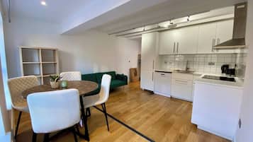 Apartamento, 1 quarto, para fumantes | Sala de jantar