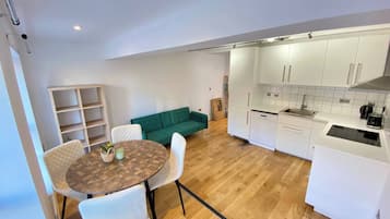 Apartamento, 1 quarto, para fumantes | Sala de jantar