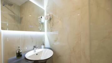 Comfort Double Room | Bathroom | Shower, hair dryer, slippers, towels