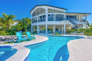 Outdoor pool, a heated pool - Morton Manor - Main House - 5bed/4.5bath single family home with private pool, dockage, pickleball court, putting green & more (Marathon)