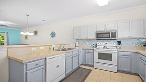 Microwave, dishwasher, coffee/tea maker, toaster - 1124 Willow Bend - Barefoot Resort Rentals (North Myrtle Beach)