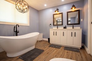 Jetted bath, hair dryer, towels, soap