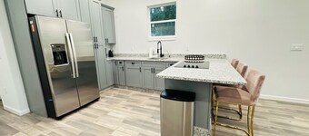 MODERN FARMHOUSE WITH A HUGE BACKYARD