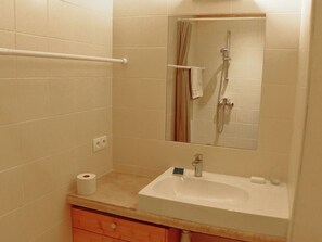 Hair dryer, towels, soap, toilet paper