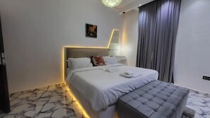 Desk, laptop workspace, blackout curtains, free WiFi - Elite Palace Hotel  (Abuja)