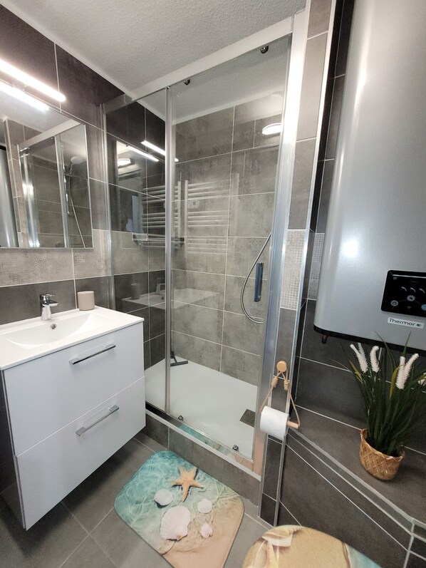 Hair dryer, towels, soap, toilet paper