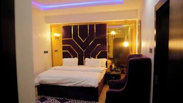 Deluxe Room, Balcony, City View | Desk, laptop workspace, blackout drapes, soundproofing