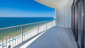 A balcony with a clear view of the beach and ocean. - Phoenix Gulf Shores Ii 2003 3 Bedroom Condo (Gulf Shores)